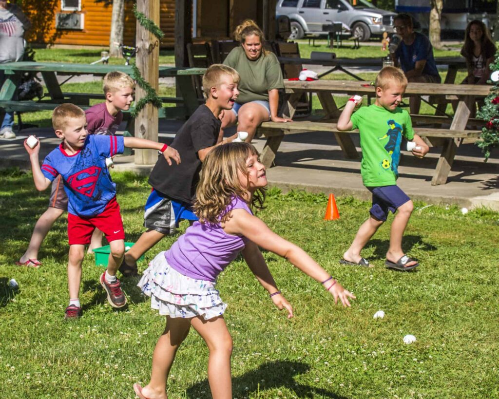 A group of kids playing frisbee.