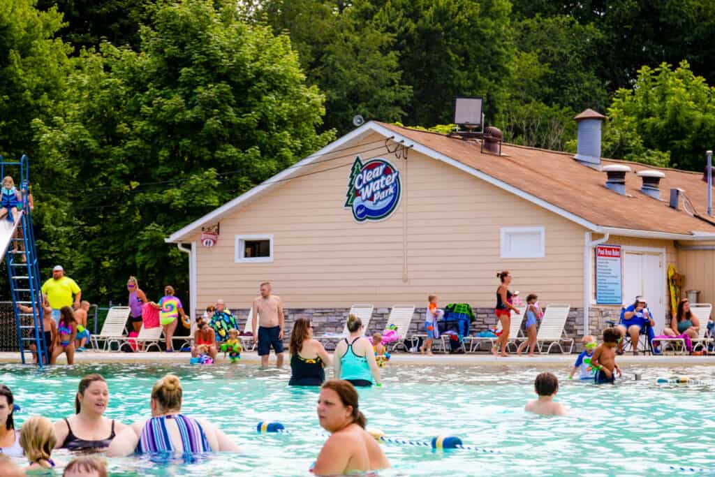 A group of people enjoying a swim at Clearwater Park.