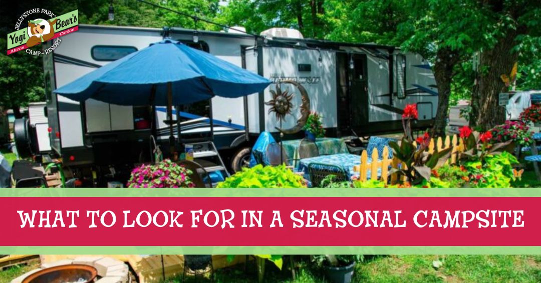 A large RV is parked at a campsite with garden furniture, potted plants, and decorations. A banner reads, "What to Look For in a Seasonal Campsite.